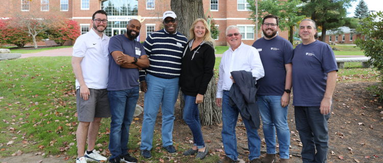 photo of alumni board members outside