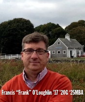 Frank in orange sweater and glasses outside
