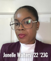 Jonelle in photo wearing glasses and blazer