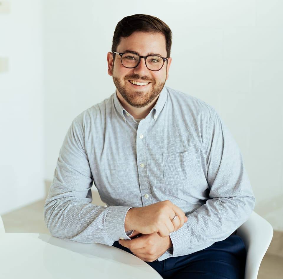 Aarron in professional headshot smiling