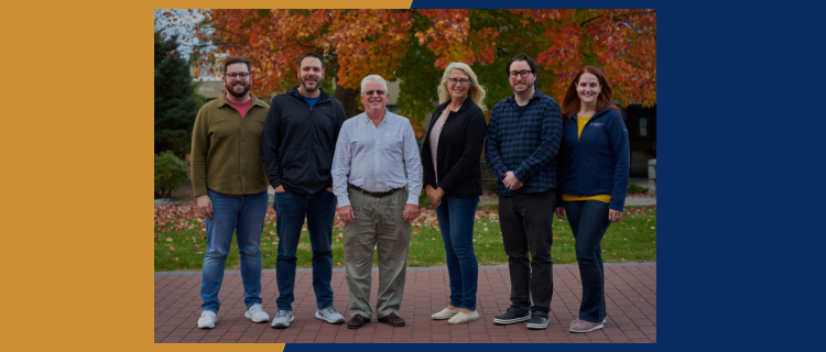 Alumni Board of Directors posed on the campus green space