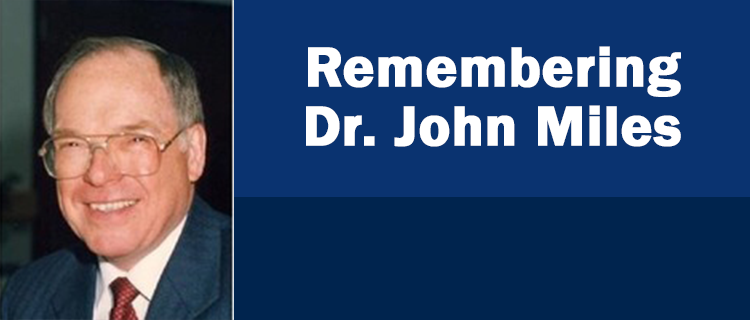 Headshot of person smiling and text that reads Remembering Dr. John Miles